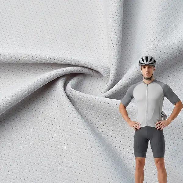 Tela de malla con protección UV para ropa: ¿Cómo mejora el uso al aire libre?